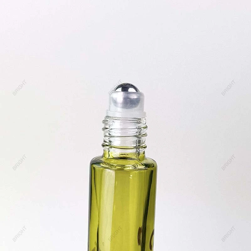 Close-up of a roller ball seated in a glass bottle neck
