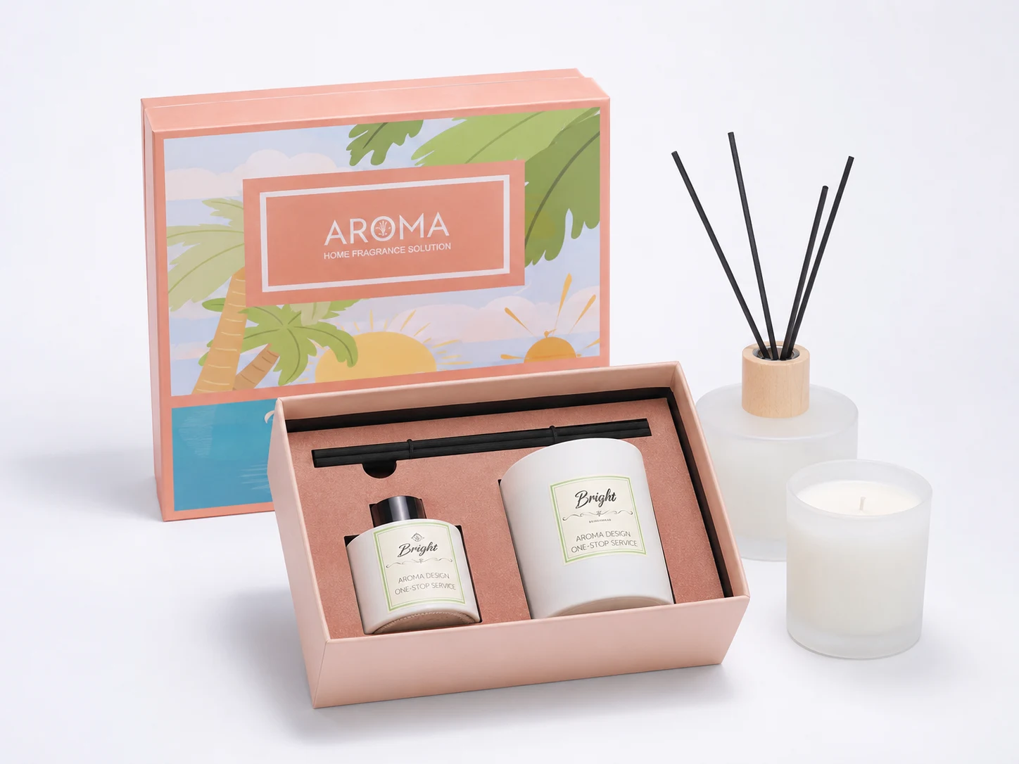 Pastel home fragrance brand set with diffuser bottles, open gift box, and coordinated packaging display