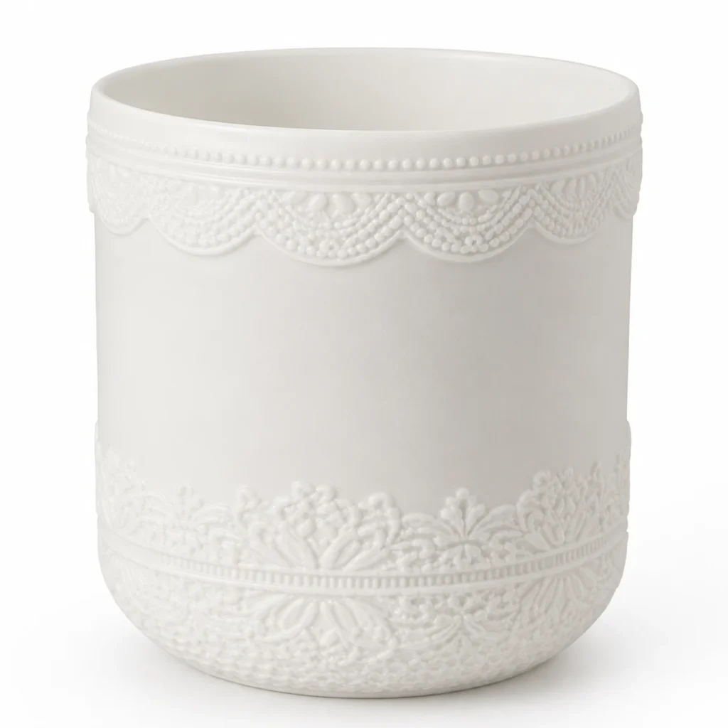 Close-up of 8oz–16oz embossed matte white ceramic candle jars showing surface, closure and container details