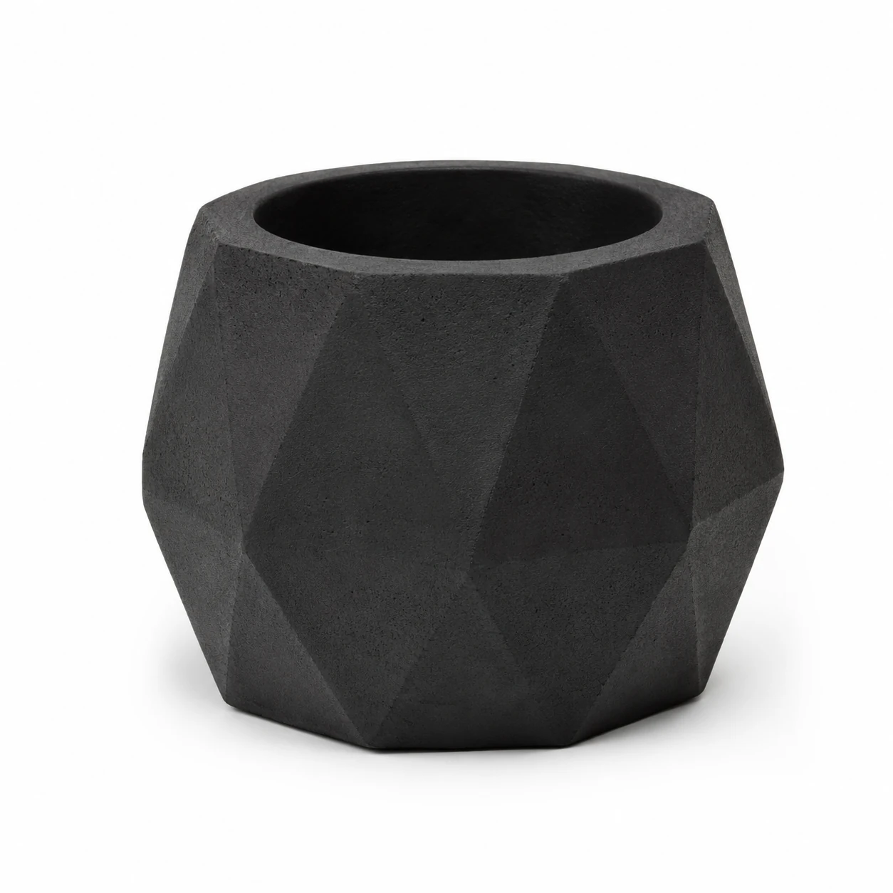 Geometric black concrete candle holder with faceted design, model BGCC138