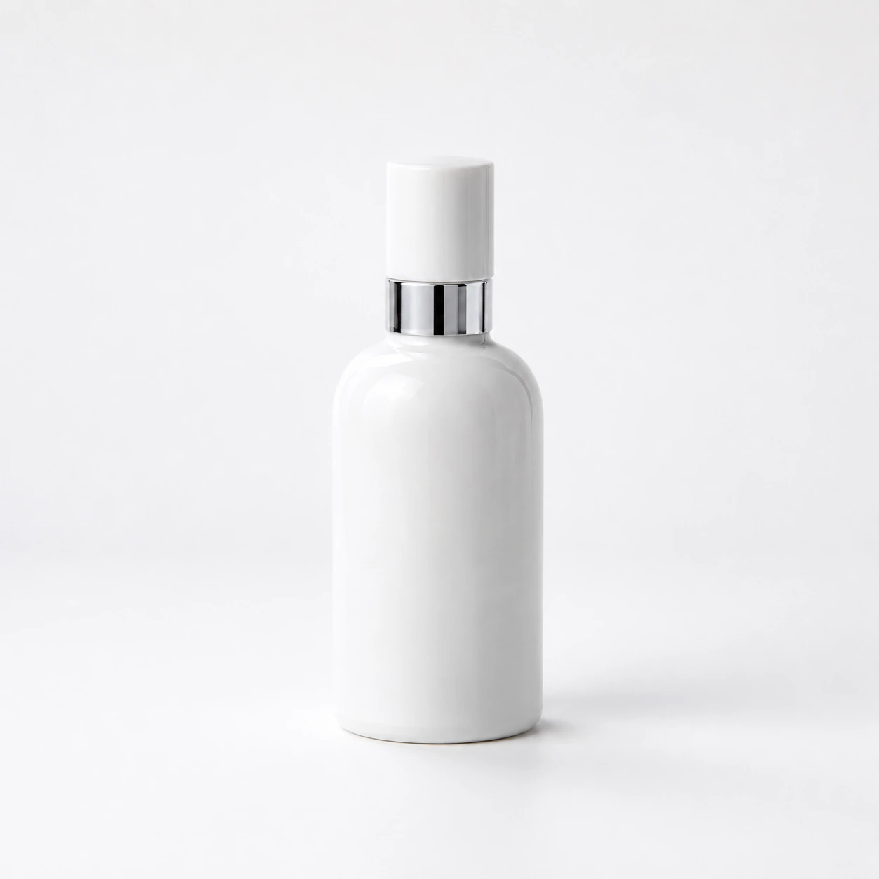 White opal glass perfume bottle in 50ml size with silver collar and white cap