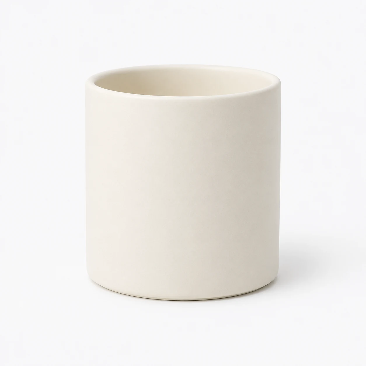 Matte cream ceramic candle jar