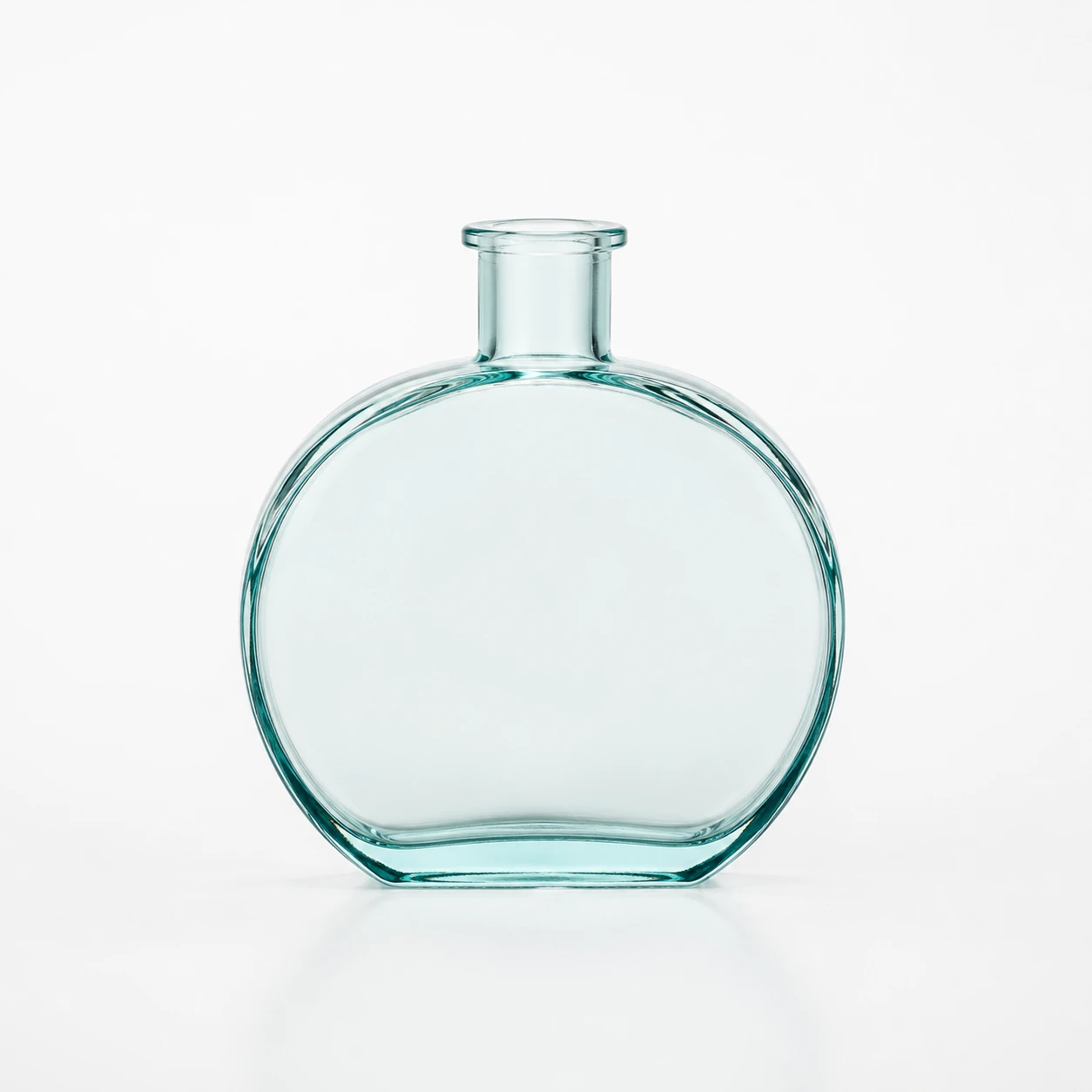 Aqua tinted flat round glass diffuser bottle