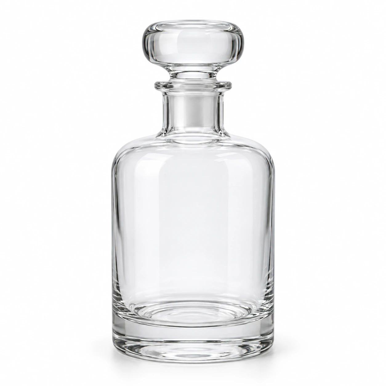 Clear decorative glass bottle with a fitted glass stopper on a clean white studio background.