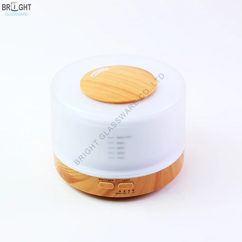 500ml cylindrical aroma diffuser with translucent white body and wood-grain base