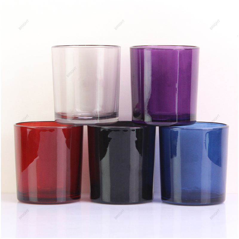 Glass candle vessels with translucent and opaque color finishes