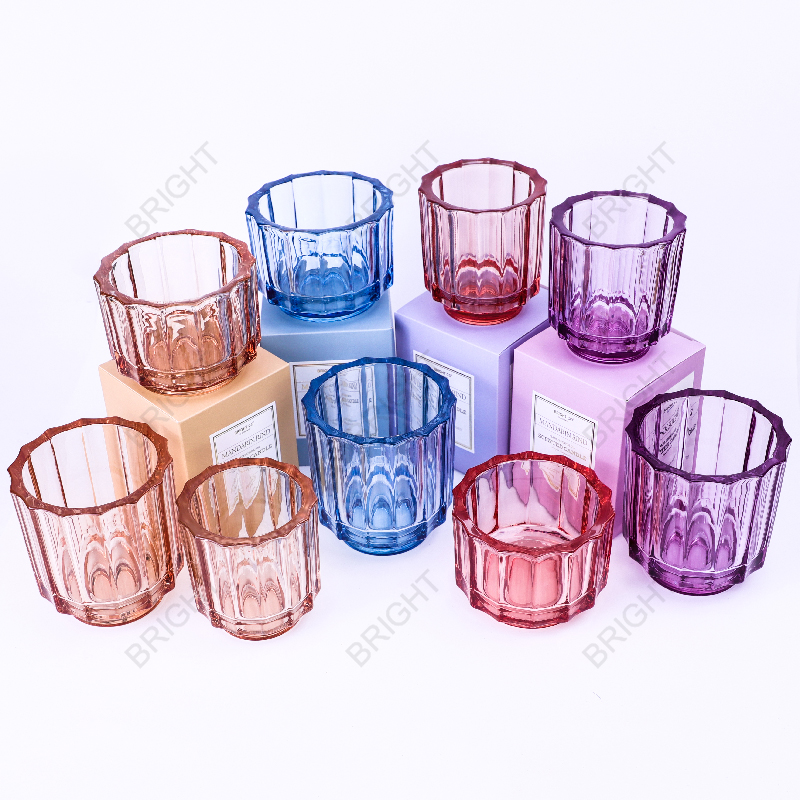 Ribbed candle jars in blue pink and purple tones