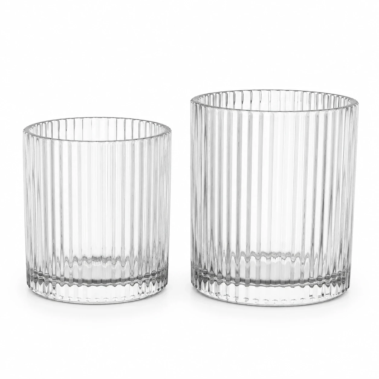 Two clear straight-sided candle jars with fluted glass walls