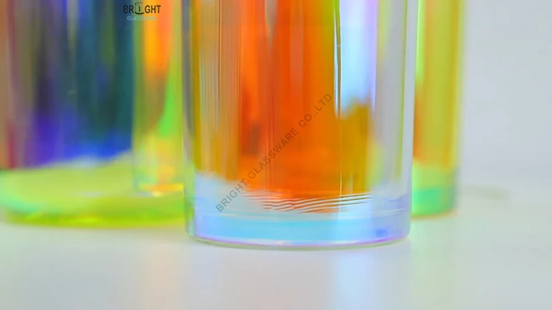 Actual glass wall waviness visible near the base of an iridescent vessel