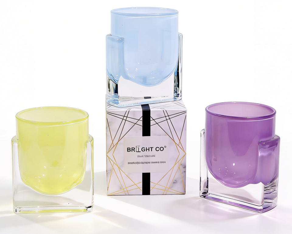 Pastel glass candle vessels with a printed box
