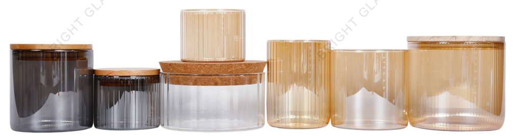 Ribbed glass candle jars with wood and cork lids