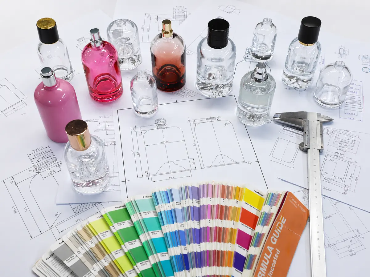 Custom glass packaging concept board with moodboard, sketches, color swatches and product ideas