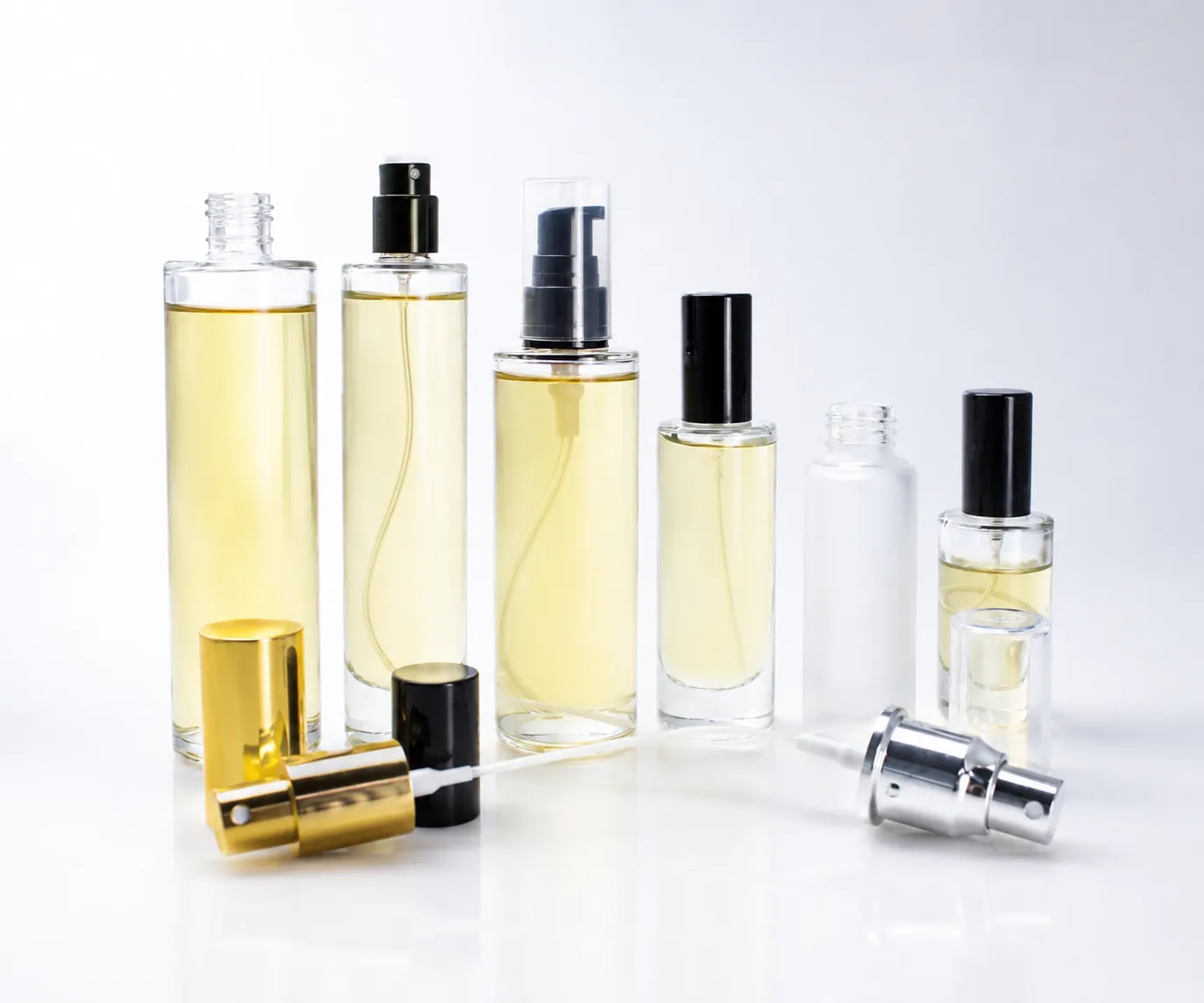 Existing standard spray and perfume bottle samples with multiple pumps, caps and closures for rapid packaging evaluation