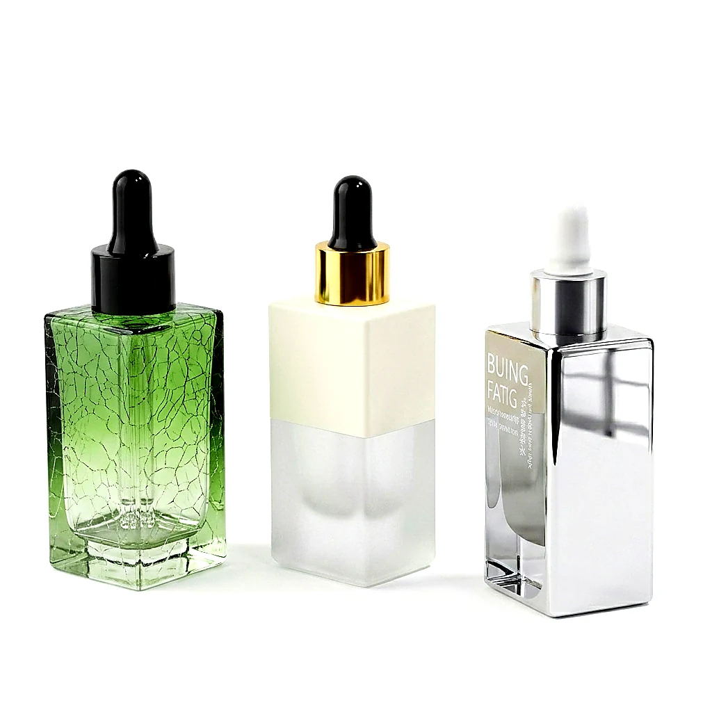 Decorated square dropper bottles with crackle, matte and mirror metallic specialty glass finishes