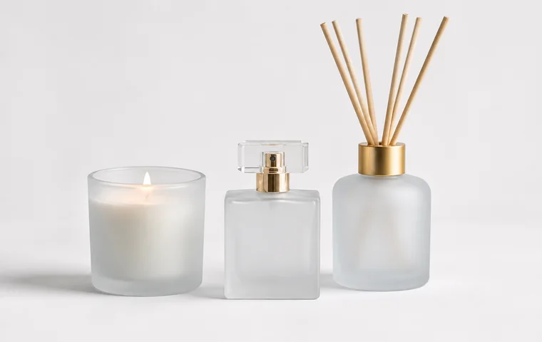 Frosted glass finish on a candle jar, perfume bottle and diffuser bottle with soft premium styling